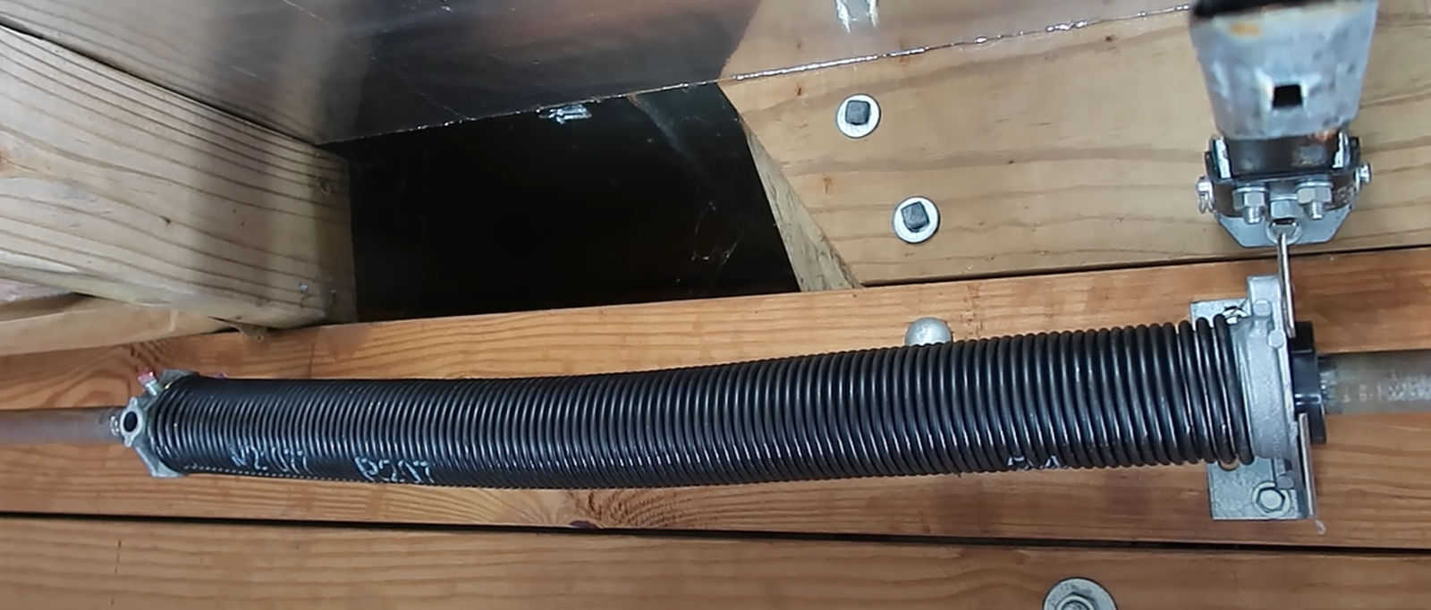Garage door spring repair service in Coral Springs, FL.