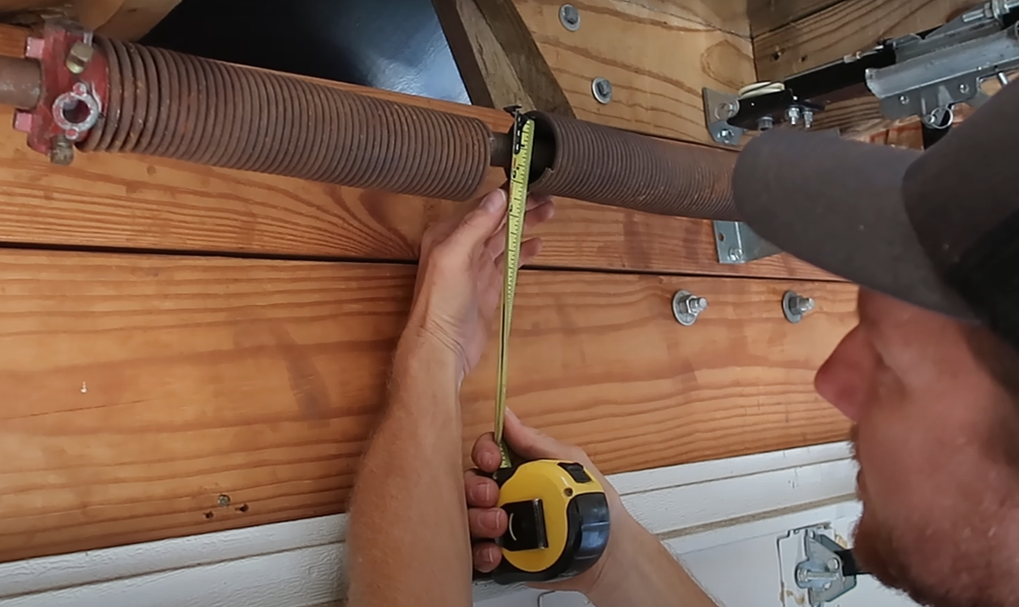 Garage door spring repair service.